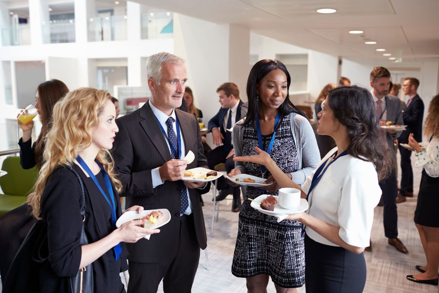 12 Essential Things to Check Before Booking a Conference Room 3 Networking Moment During Booking a Conference Room Event