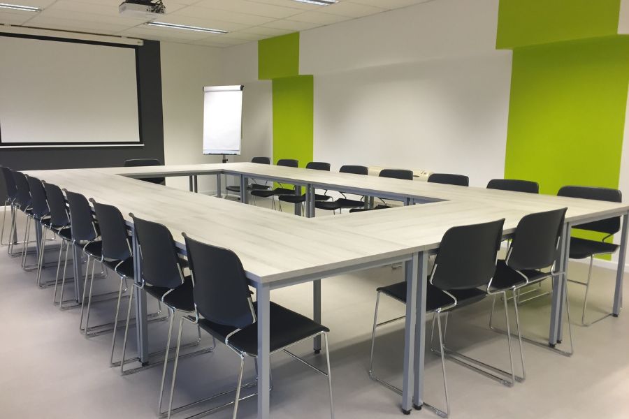 Modern U-Shaped Setup for Booking a Conference Room